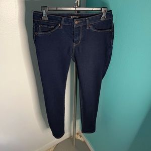 Dark blue jeans- Perfect with any style top